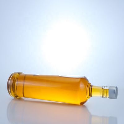 Προσαρμοσμένο σχεδιασμό 750ml μπουκάλι γυαλιού ουίσκι με υλικό και καθαρό ή προσαρμοσμένο χρώμα