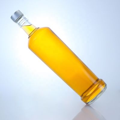 Προσαρμοσμένο σχεδιασμό 750ml μπουκάλι γυαλιού ουίσκι με υλικό και καθαρό ή προσαρμοσμένο χρώμα