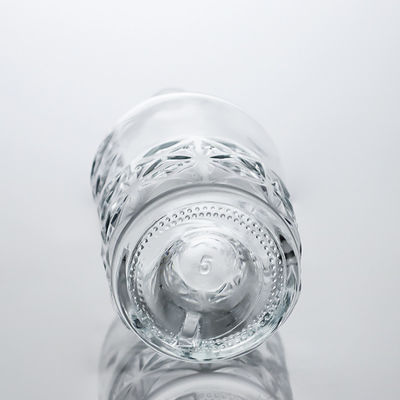 Προσαρμοσμένο σχήμα 750 ml Χρωμικό γυαλισμένο μετάξι εκτύπωση Πιεσμένο κρασί Σαμπάνια γυάλινο μπουκάλι με μεταλλικές ετικέτες