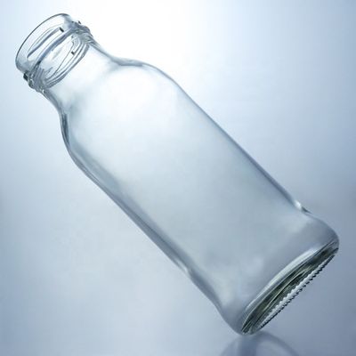 Διαυγές γυάλινο μπουκάλι ποτών δημοφιλές 100ml260ml 500ml 1000ml στρογγυλό μπουκάλι με καπάκι βίδας
