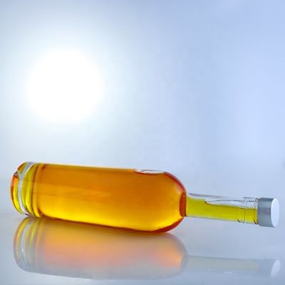 Προσαρμοσμένο λογότυπο 700ml 750ml High Flint Round Shape Glass Flask με επικάλυψη βίδες