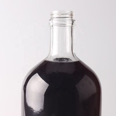 Προσαρμοσμένο στρογγυλό γυάλινο μπουκάλι 500 ml 750 ml με φελλό καπάκι και προσαρμοσμένο λογότυπο