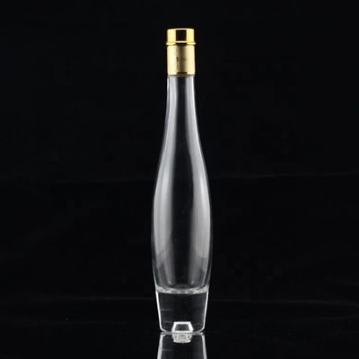 750 ml βαριά φιάλη καθαρού γυαλιού αλκοόλης με χρυσό μεταλλικό καπάκι σε χύδη