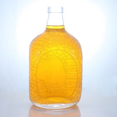 Μοναδικό στρογγυλό σχήμα ανάγλυφο τροφικό ρούμι βότκα ουίσκι τεκίλα τζιν γυάλινο μπουκάλι με φελλό τέλεια