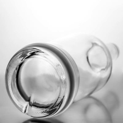 Προσαρμοσμένο λογότυπο γυάλινο κολάρο 700ml στρογγυλό μπουκάλι αλκοόλ για βότκα μπράντυ ουίσκι και περισσότερα