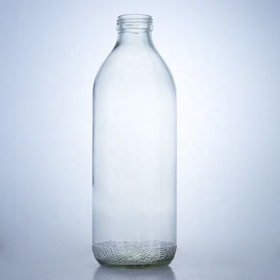 Διαφανή γυάλινα μπουκάλια 1020 ml με καπάκι με βίδα και μοναδικό σχήμα