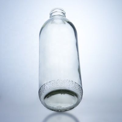 Διαφανή γυάλινα μπουκάλια 1020 ml με καπάκι με βίδα και μοναδικό σχήμα