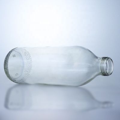 Διαφανή γυάλινα μπουκάλια 1020 ml με καπάκι με βίδα και μοναδικό σχήμα