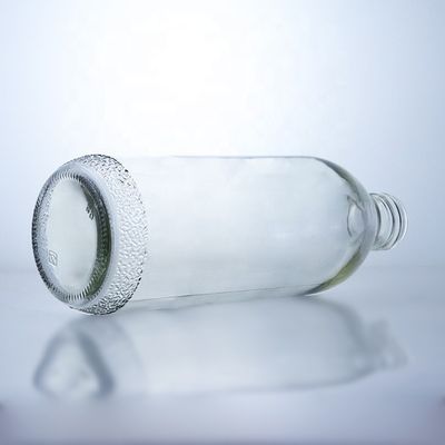 Διαφανή γυάλινα μπουκάλια 1020 ml με καπάκι με βίδα και μοναδικό σχήμα